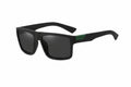 Black sunglasses with a green logo on a white background